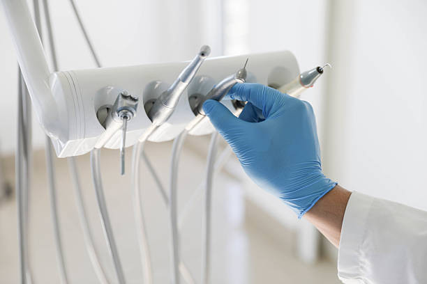 Professional Root Canal Treatment technician working in Arcola, TX
